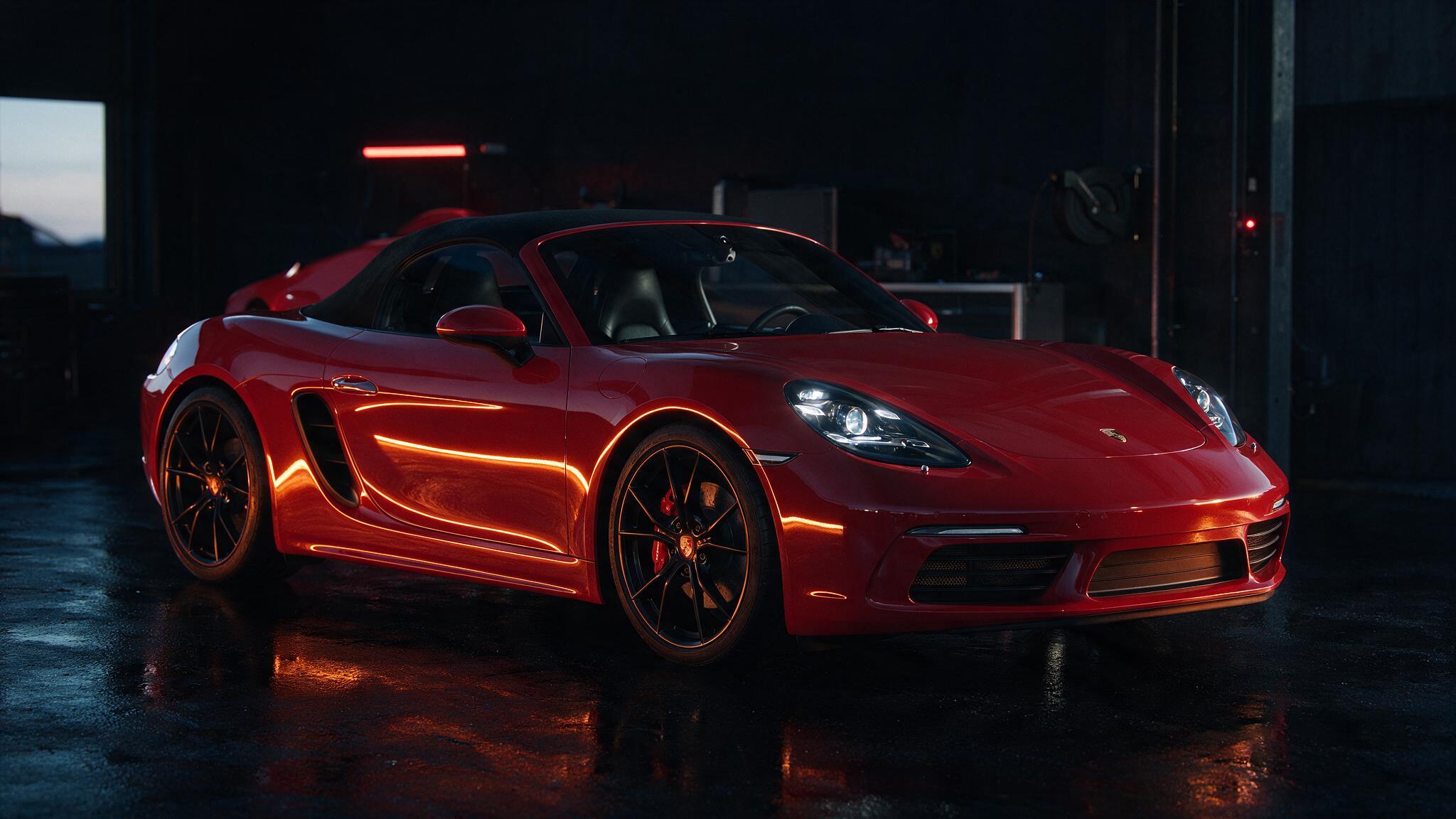 Porsche 718 Boxster S in een donkere werkplaats