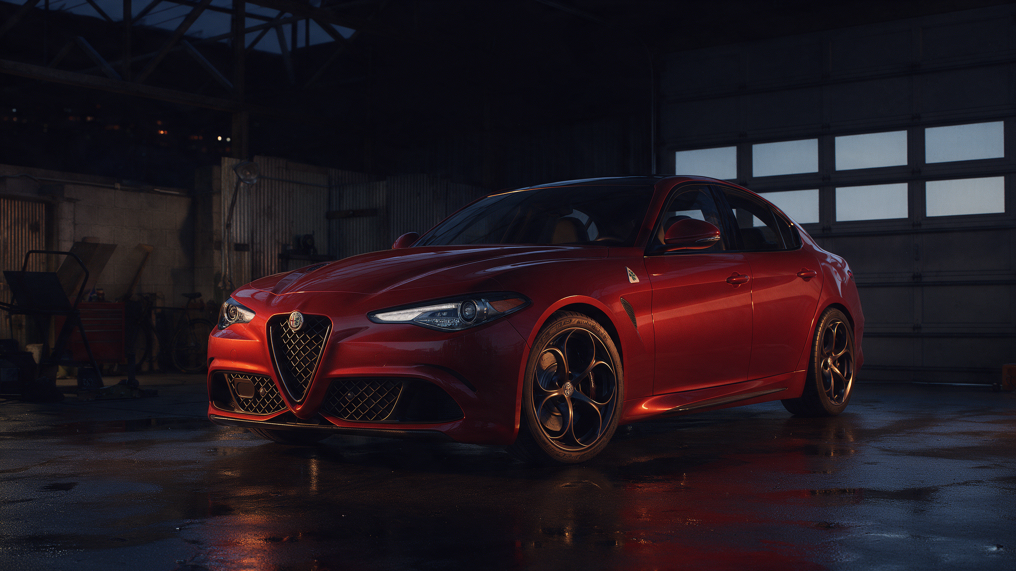 Alfa Romeo Giulia in donkere werkplaats