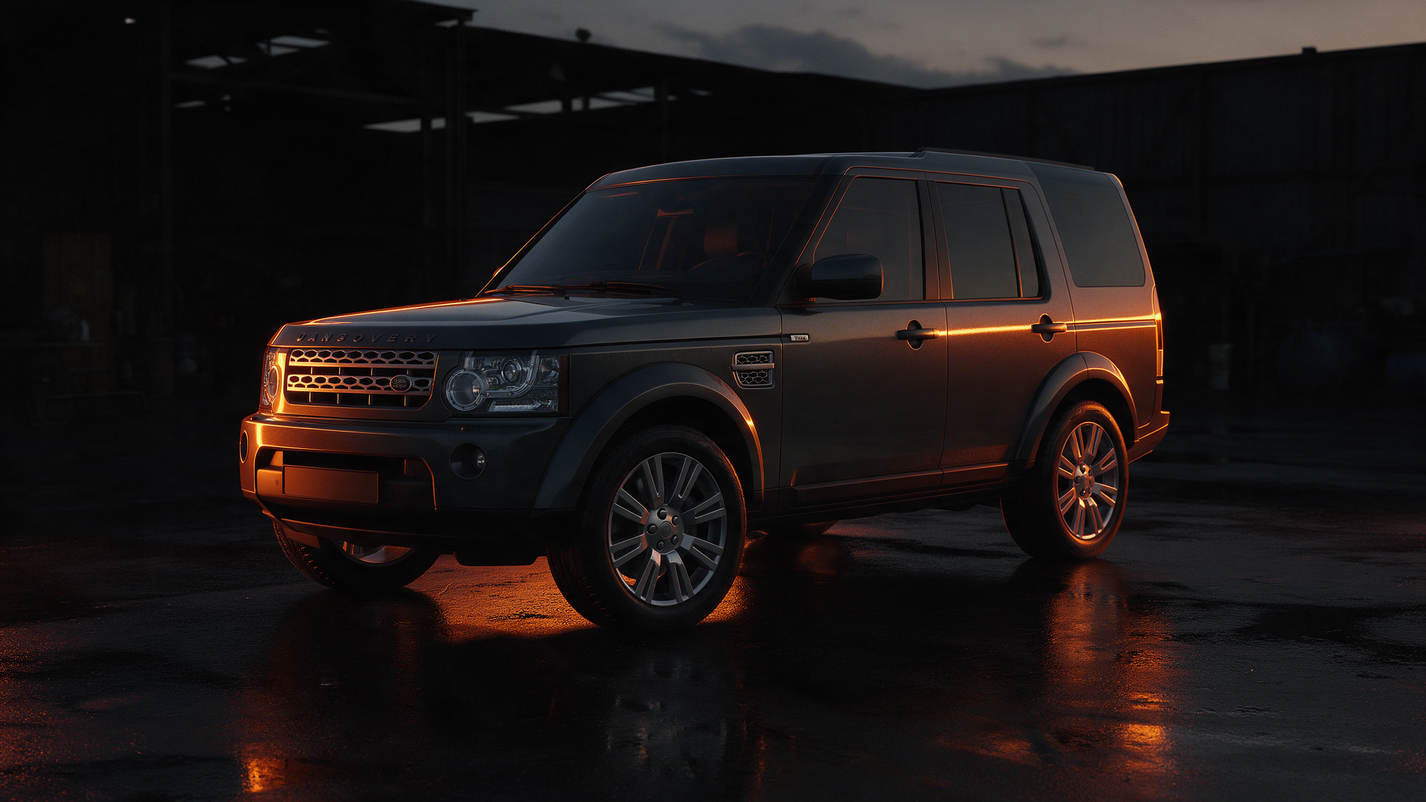 Land Rover Discovery 3.0 TDV6 in een donkere werkplaats bij schemering